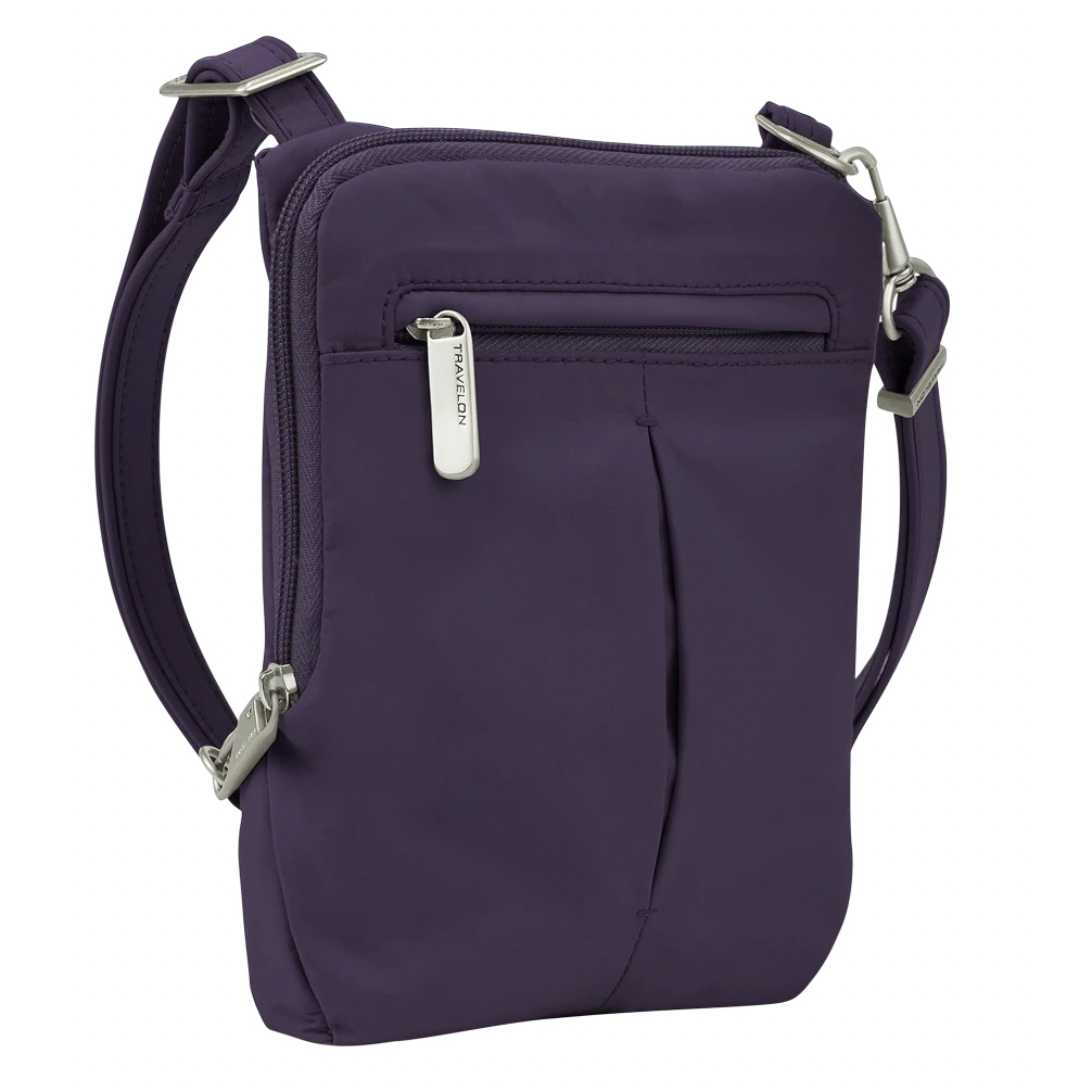 Travelon Anti-Theft Slim Pouch in purple features a compact design with a front zipper pocket, adjustable strap, and silver-tone hardware for security and convenience.