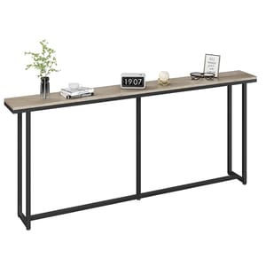 A sleek 71-inch console table with a thin rectangular wooden top and black metal frame. Decorated minimally with items like a vase, books, clock, glasses, and a framed quote. Ideal for narrow spaces.