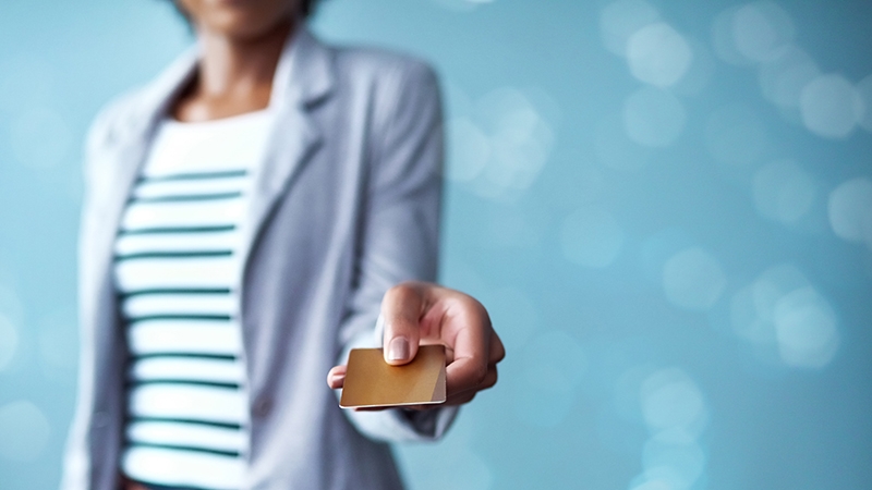 woman paying with credit card