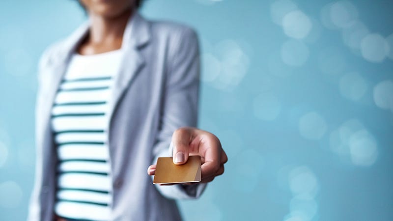 woman paying with credit card