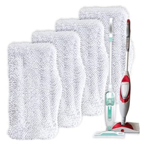 Steam mop with detachable handheld steamer and five white microfiber cleaning pads.