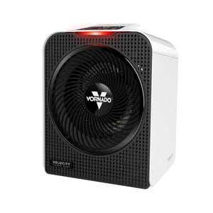 White and black Vornado Velocity space heater with a large front fan, compact rectangular design, and control panel on top, featuring a distinctive spiral grill.