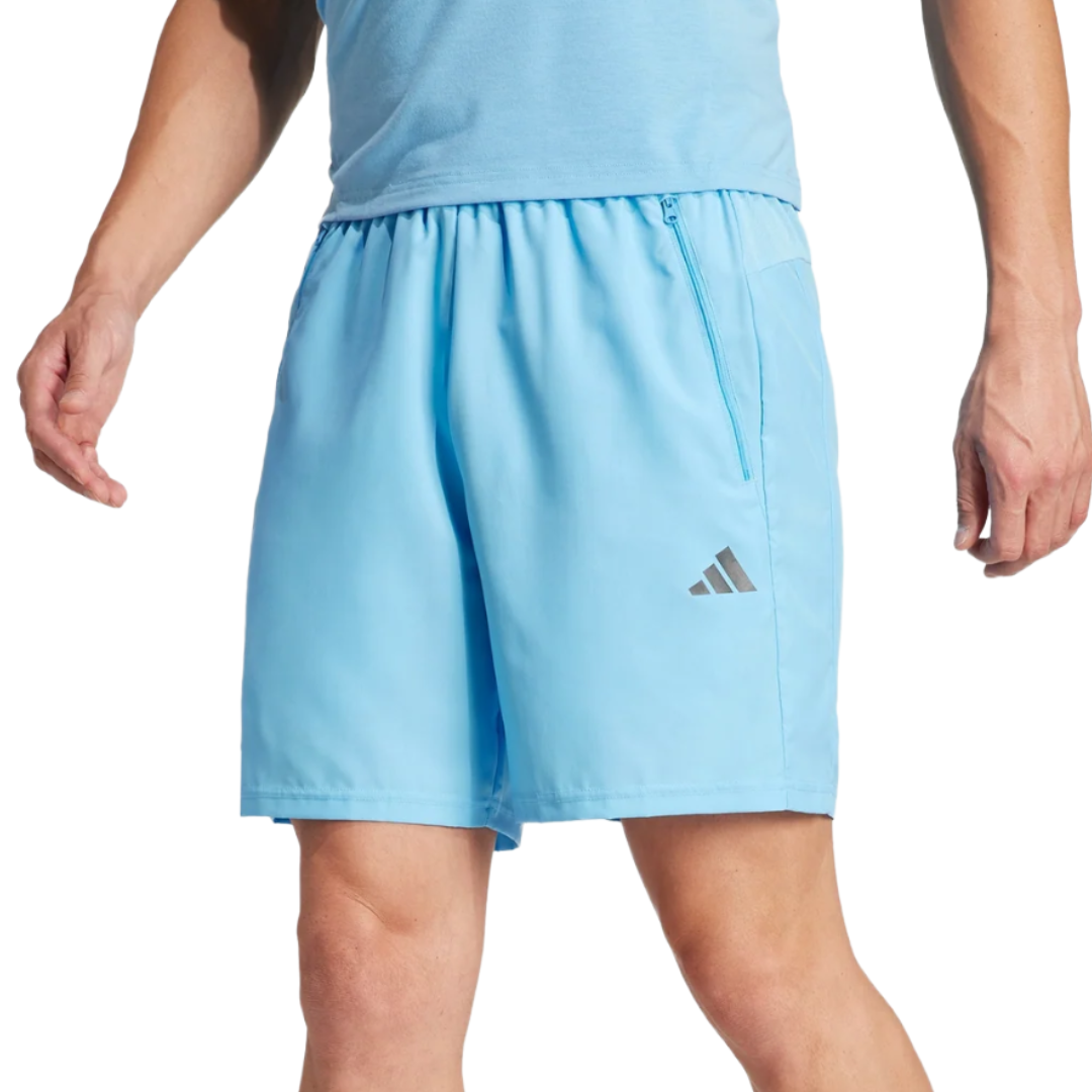 Light blue athletic shorts with an elastic waistband, a zippered pocket, and an Adidas logo.