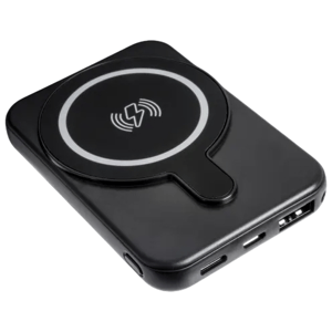 A black portable wireless charger with a circular charging symbol, featuring USB ports on the side for wired connections.