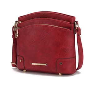 A red MKF crossbody bag features multiple zippered compartments, a sleek design, and gold-tone hardware with a detachable shoulder strap.