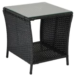 A black wicker side table with a glass top, featuring a shelf underneath for additional storage.