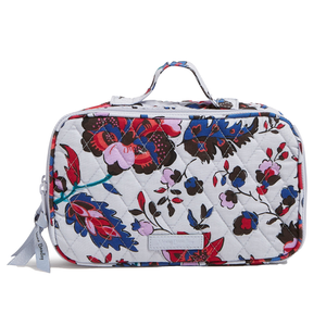 Rectangular quilted makeup case with a floral pattern in shades of blue, red, and pink. Features a top handle and a zipper closure.