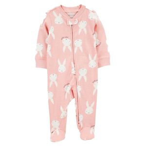 Pink long-sleeve baby sleeper featuring a white bunny pattern, with a diagonal zipper and snap closure at the collar, designed with footed bottoms for warmth and comfort.