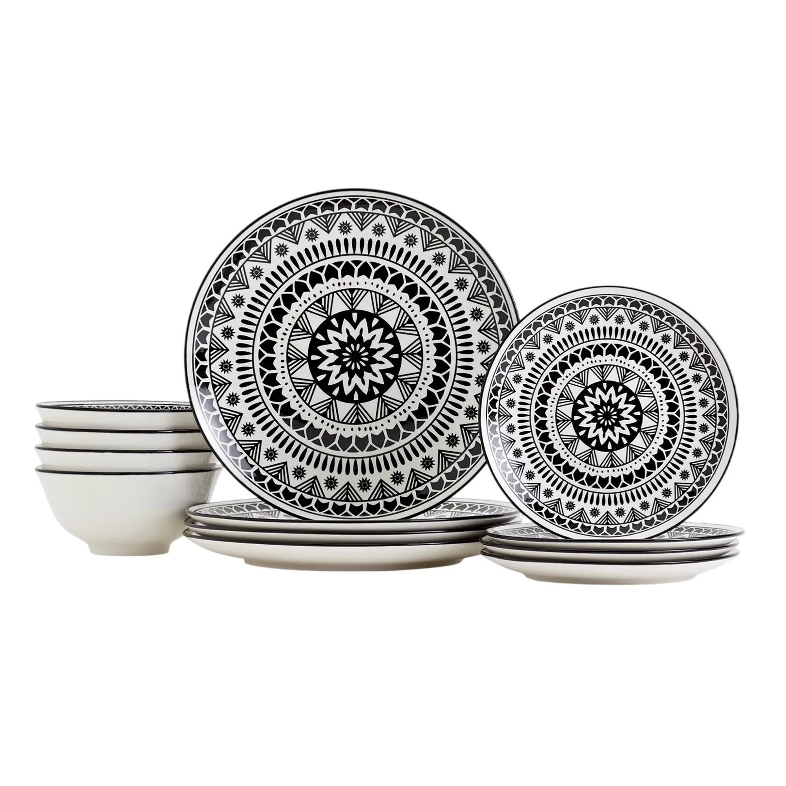 Set of black-and-white dinnerware featuring intricate geometric patterns, including large plates, small plates, and bowls.