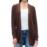 A woman is wearing a brown ribbed knit cardigan over a white tank top and jeans. The cardigan features an open front design with pockets.