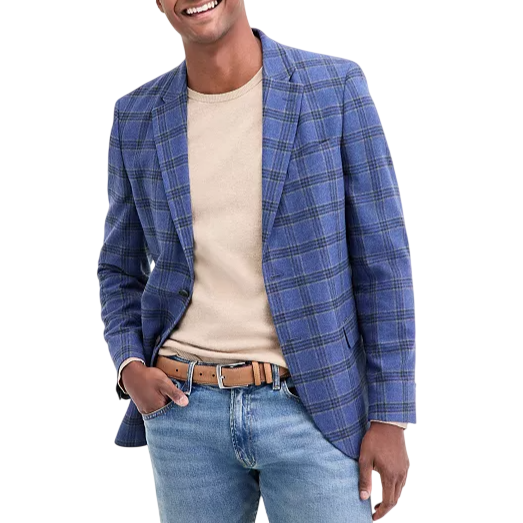 A person is wearing a blue plaid blazer over a beige shirt, paired with light blue jeans and a tan belt.