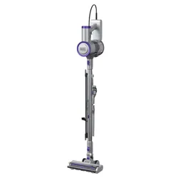 A cordless stick vacuum cleaner with a sleek, gray and purple design, featuring a wall-mounted charging station.