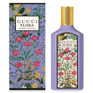 Gucci Flora Gorgeous Magnolia Eau de Parfum, 100 ml, features a floral design on both the lavender bottle and the packaging.