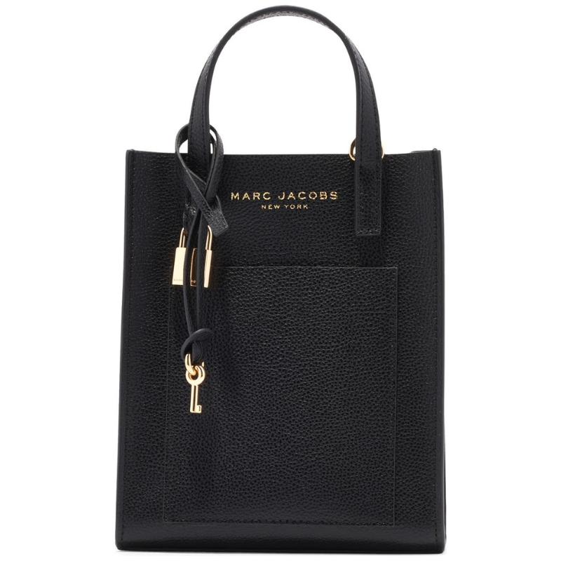 Black Marc Jacobs handbag with gold logo and detailing, featuring a front pocket and top handles.