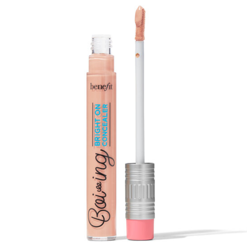 Benefit Boi-ing Bright On Concealer with applicator wand, peachy shade, clear container, silver and pink cap.