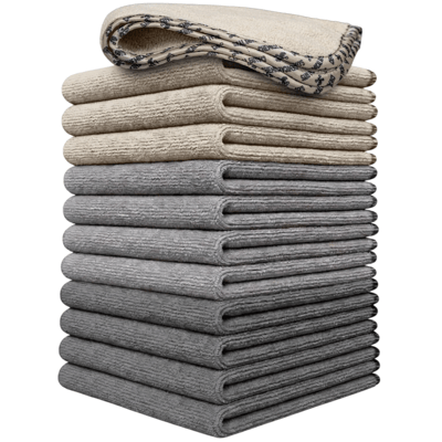 A stack of beige and gray microfiber towels is shown, with the top towel featuring a patterned edge.