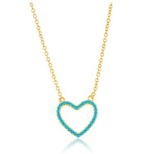 Gold chain necklace with a heart-shaped pendant encrusted with small turquoise stones.