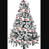 A snow-flocked artificial Christmas tree with a spiral ribbon featuring red trucks and \“Merry Christmas\“ text. The tree includes a black metal stand.