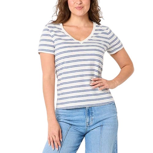 A woman wears a short-sleeve, V-neck striped T-shirt with blue and white stripes, paired with light blue jeans.