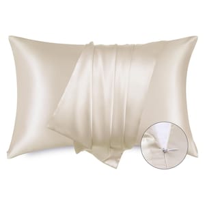 A cream-colored, smooth satin pillowcase with a hidden zipper closure is shown, offering a soft and sleek appearance.