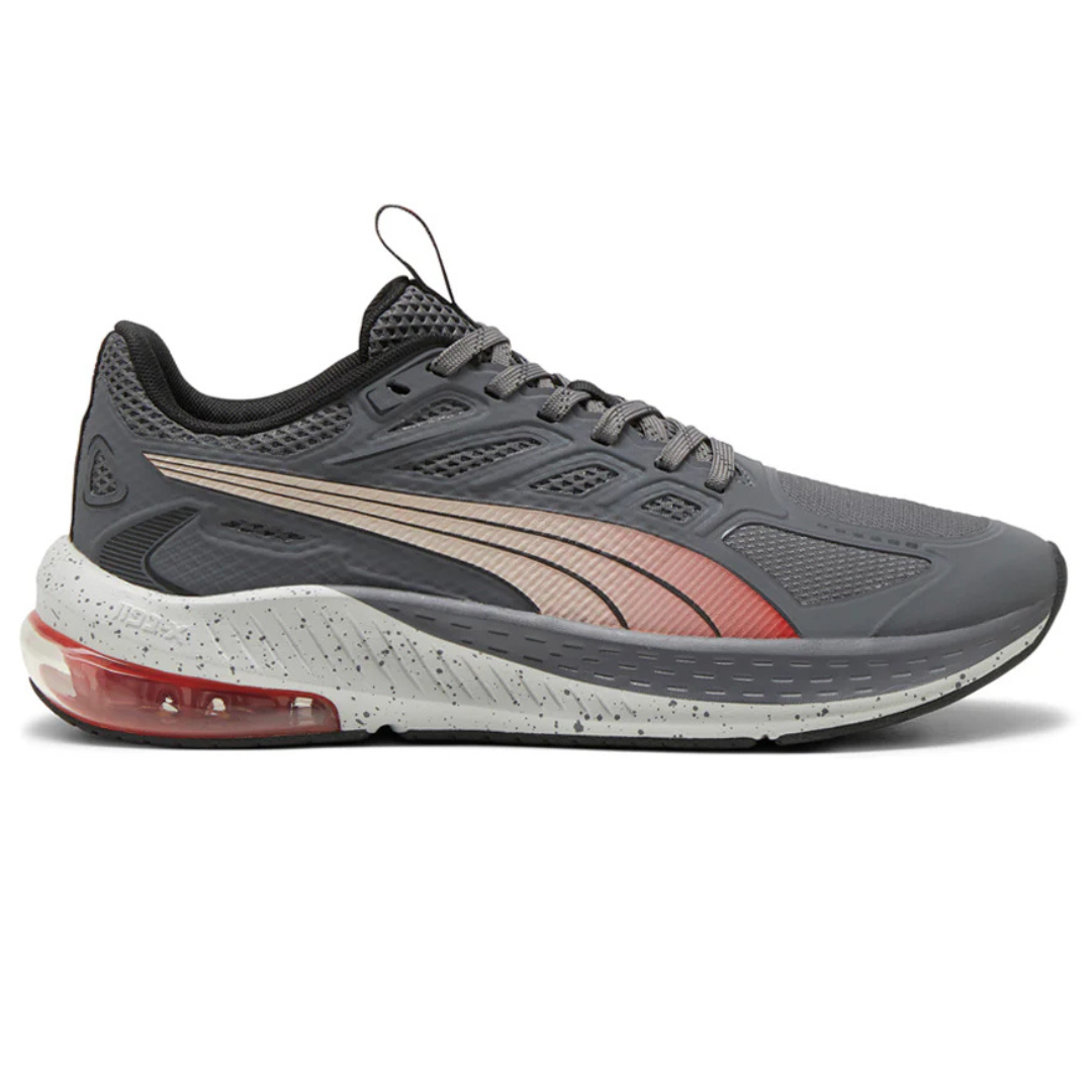 Puma X-Cell Lightspeed Shoes are gray athletic sneakers featuring a sleek design, a visible air cushioning unit in the midsole, and a two-tone gradient Puma stripe on the side.