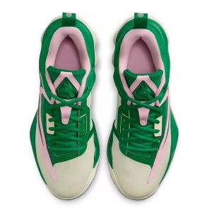 A pair of green and pink sneakers viewed from above.