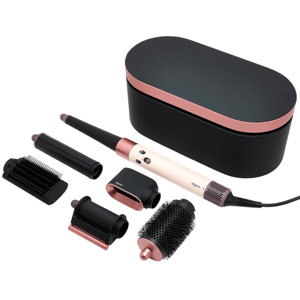 Dyson hair styling tool set includes a main device and multiple attachments for curling, smoothing, and volumizing. The set comes in a black and rose gold design with a storage case.