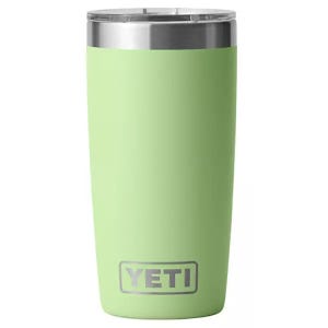 A light green YETI tumbler with a stainless steel lid.