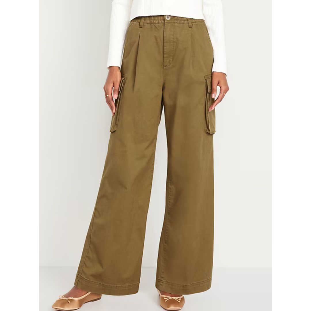 Olive green wide-leg cargo pants with large side pockets and a high waist, paired with light-colored heeled sandals.