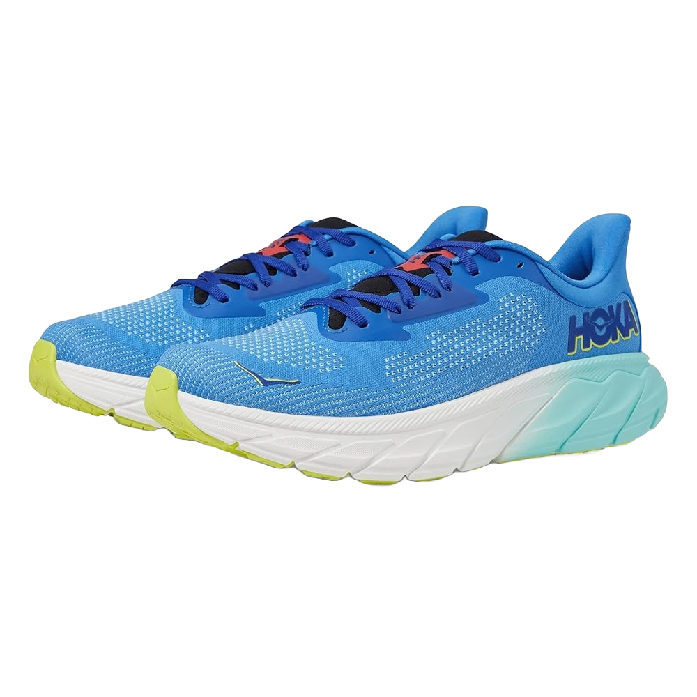 Blue Hoka running shoes feature a white and light green sole, with orange and blue accents, offering cushioning and support.