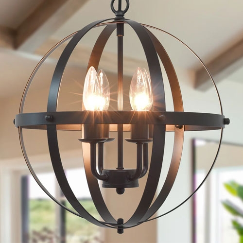 A spherical metal chandelier with three exposed bulb sockets, featuring a rustic design, hanging from a ceiling in a well-lit room.