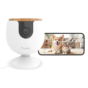 A Furbo pet camera with treat-tossing capability is shown next to a smartphone displaying a live video feed of a dog and cat.