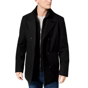 A man is wearing a classic black double-breasted pea coat over a textured sweater, paired with jeans.