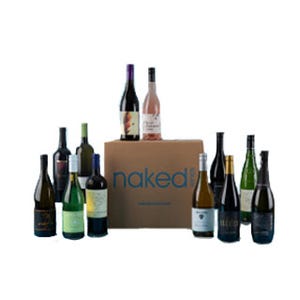A selection of various wine bottles displayed in front of a cardboard box with the word \“naked\“ on it.