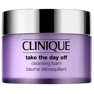 Clinique Take The Day Off Cleansing Balm, a makeup remover in a purple jar with a silver lid, labeled in English and French.