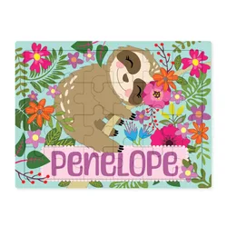 A colorful puzzle featuring a sleeping sloth surrounded by vibrant flowers and leaves, with the name \“Penelope\“ in purple letters at the bottom.