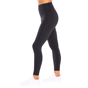 High-waisted black leggings paired with white athletic sneakers.