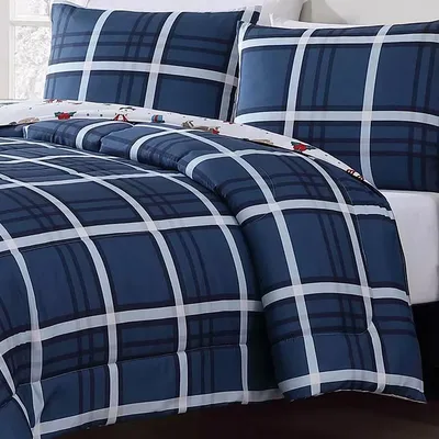 A bedding set featuring a blue and white plaid comforter and matching pillow shams.