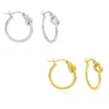 Two pairs of hoop earrings, one in silver and the other in gold, each featuring a knot design near the clasp.