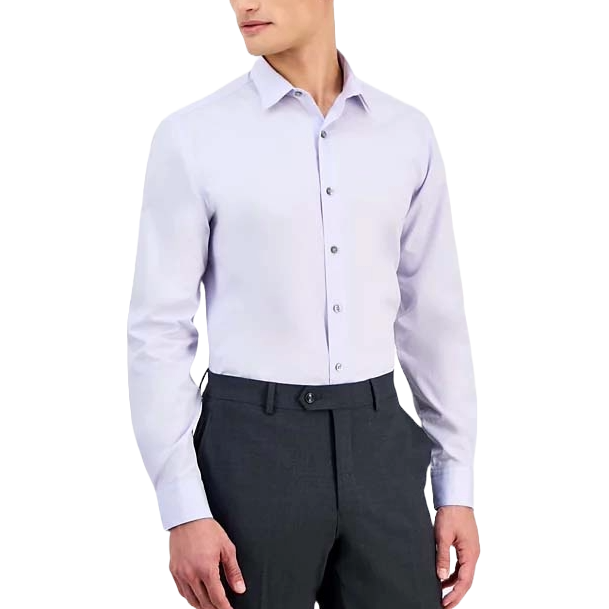 A man is wearing a light lavender long-sleeve dress shirt paired with dark gray trousers.