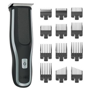 Wahl Cordless Hair Clippers feature a black and silver design with a textured grip and power button, alongside 12 guide combs labeled with lengths from 1/16 to 1 inch, including right and left ear tapers.