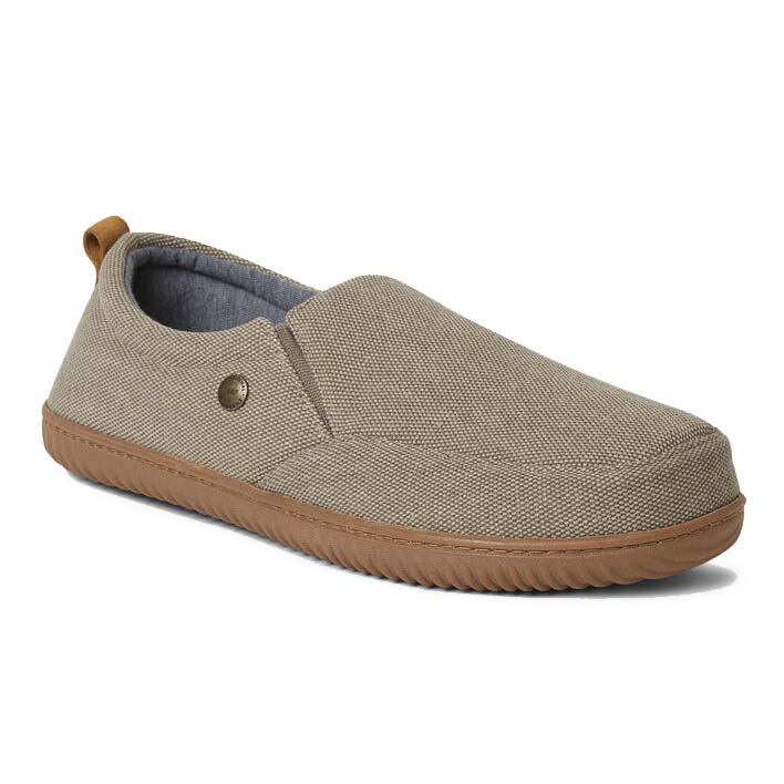 Men's Dearfoams Closed-Back Slippers are slip-on shoes with a textured tan fabric, brown rubber soles, and a decorative metal button. They have a closed heel and a pull tab at the back for easy wear.