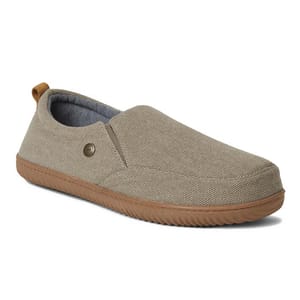 Men's Dearfoams Closed-Back Slippers are slip-on shoes with a textured tan fabric, brown rubber soles, and a decorative metal button. They have a closed heel and a pull tab at the back for easy wear.