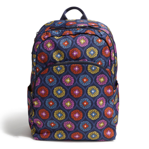 A colorful backpack with a floral pattern design.