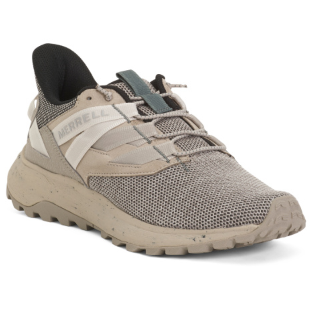 Merrell hiking shoe in beige and black with a mesh upper, speckled sole, and elastic lacing.