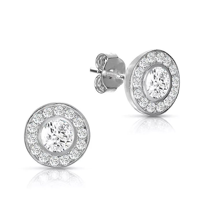 Sterling Silver CZ Halo Stud Earrings feature a central round cubic zirconia stone surrounded by a halo of smaller CZ stones set in a circular design, with post and butterfly backs for secure fastening.
