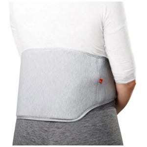 Heated back massager with adjustable fit, featuring a grey fabric exterior, designed to provide warmth and tension relief for the lower back.