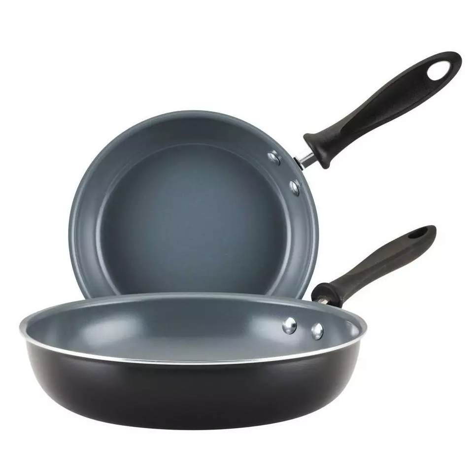 A set of two Farberware nonstick skillets with black handles. They feature a durable nonstick interior for easy cooking and cleaning.