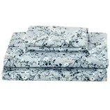 A set of pale blue floral bed sheets, including a flat sheet, fitted sheet, and pillowcase with a delicate white and dark blue flower pattern.