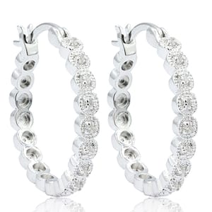 Silver hoop earrings embellished with round, sparkling stones.